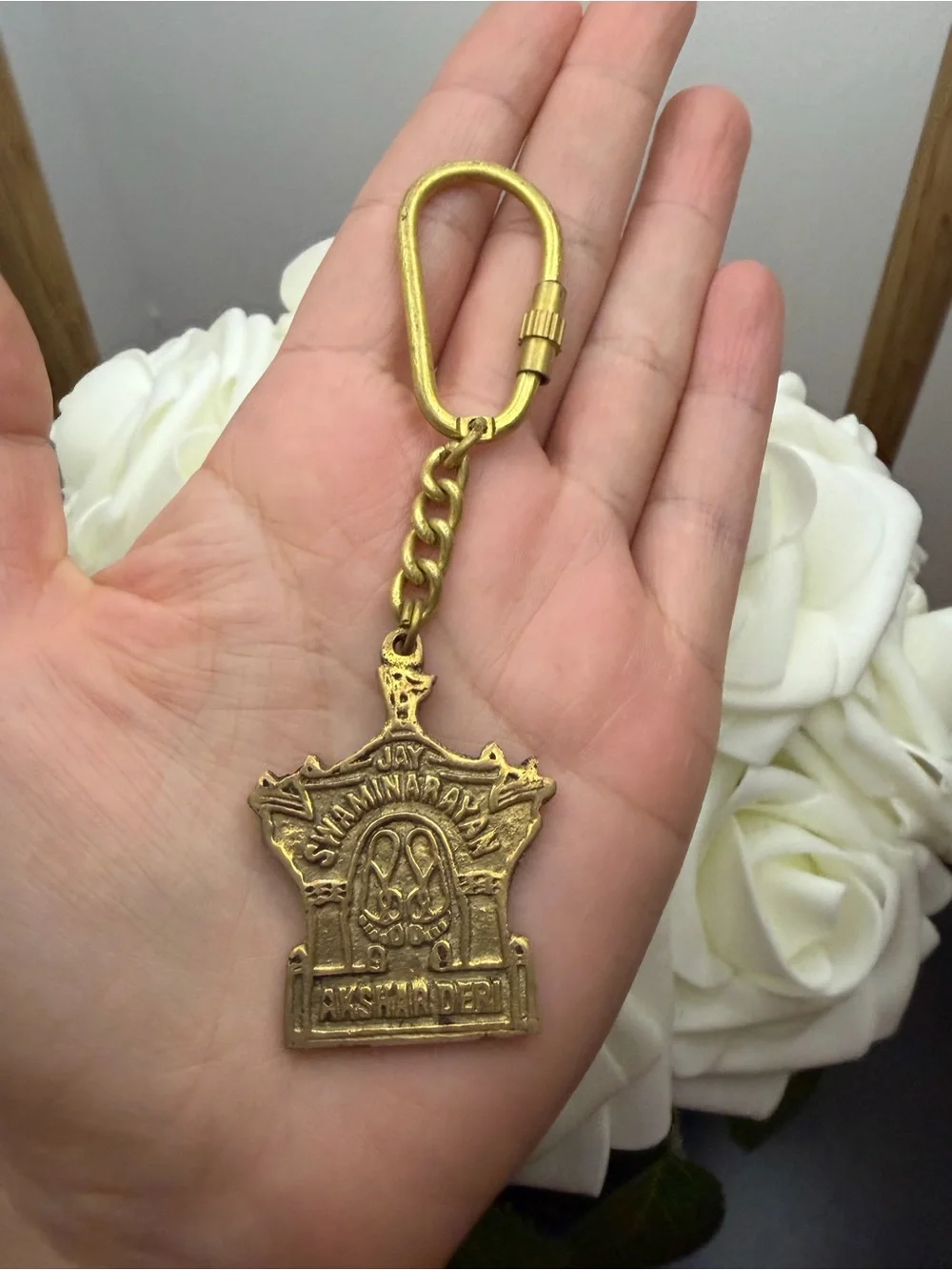 Gold Temple Keychain with Religious Motif